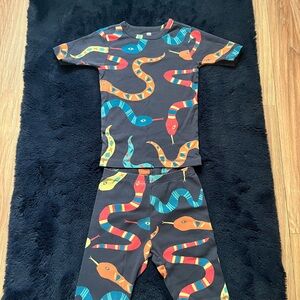 Tea Collection Blue and Orange Pajama Sets with Space-Themed Design